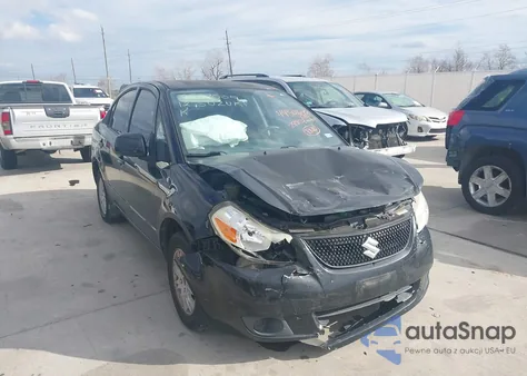 2012 Suzuki Sx4 Le/Le Popular z USA, uszkodzony, nr VIN JS2YC5A32C6304342